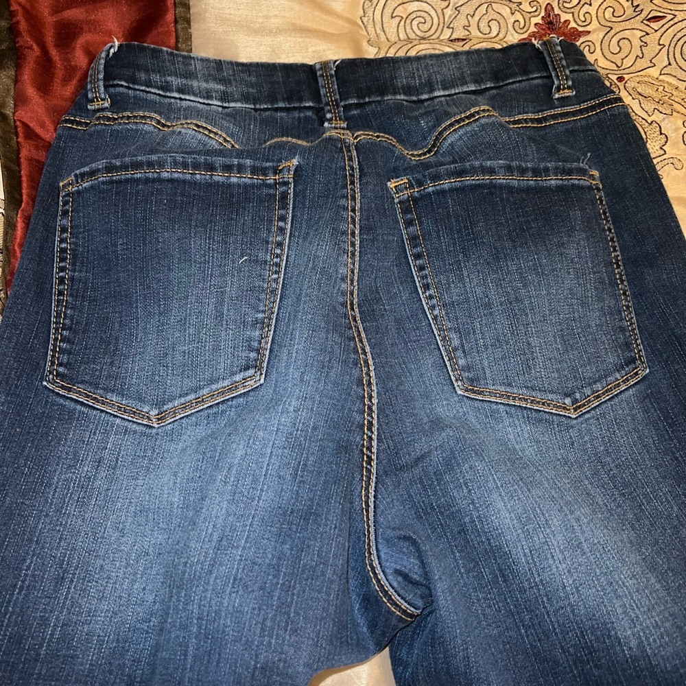 Dark denim, very comfy with a stretch, size 13
